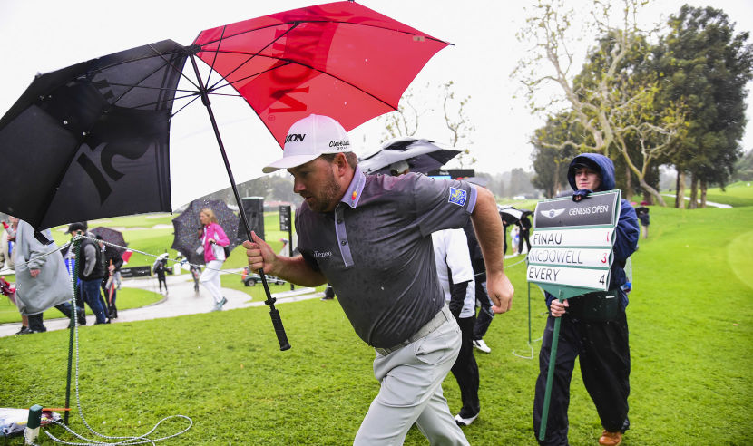 PACIFIC PALISADES, CA - FEBRUARY 17: Graeme McDowell of Northern Ireland exits the course as play is called due to inclement weather during the second round at the Genesis Open at Riviera Country Club on February 17, 2017 in Pacific Palisades, California.  (Photo by Harry How/Getty Images)