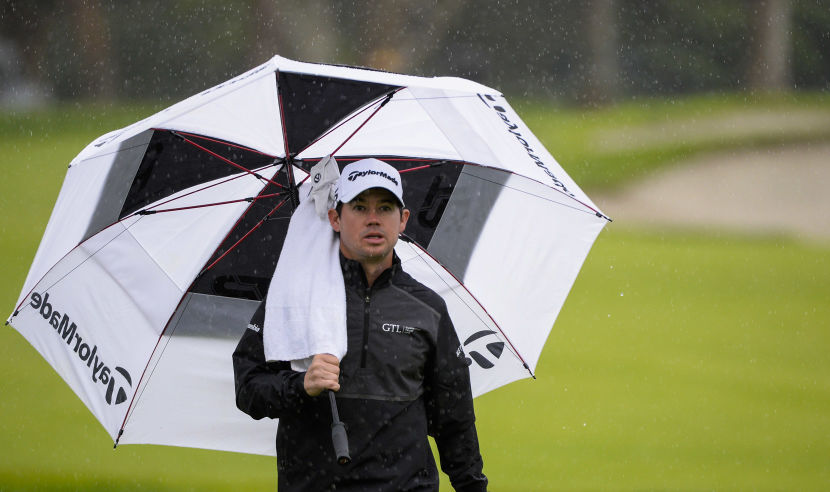 PACIFIC PALISADES, CA - FEBRUARY 17: Brian Harmanl exits the course as play is called due to inclement weather during the second round at the Genesis Open at Riviera Country Club on February 17, 2017 in Pacific Palisades, California.  (Photo by Robert Laberge/Getty Images)