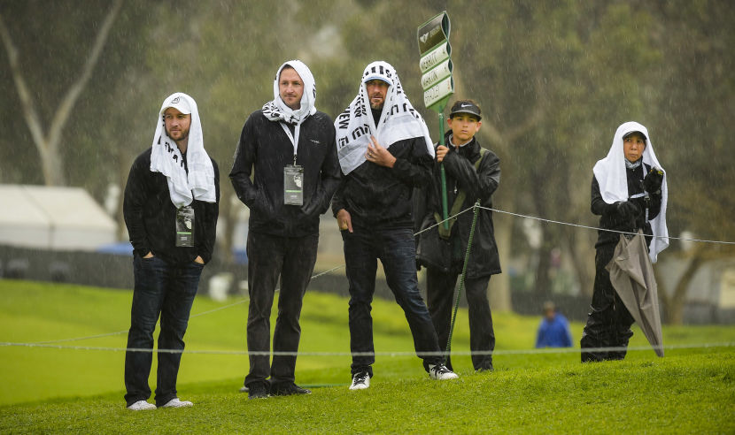 PACIFIC PALISADES, CA - FEBRUARY 17: Fans watch play on the ninth hole before play was suspened due to weather conditions during the second round of the Genesis Open at Riviera Country Club on February 17, 2017 in Pacific Palisades, California. (Photo by Stan Badz/PGA TOUR)