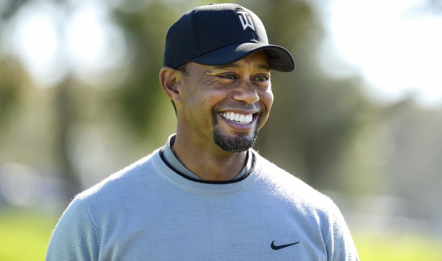 SAN DEIGO, CA - JANUARY 25: Tiger Woods smiles as he waits to play the 14th hole on the north course during the Pro-Am round for the Farmers Insurance Open at Torrey Pines Golf Course on January 25, 2017 in San Diego, California. (Photo by Stan Badz/PGA TOUR)