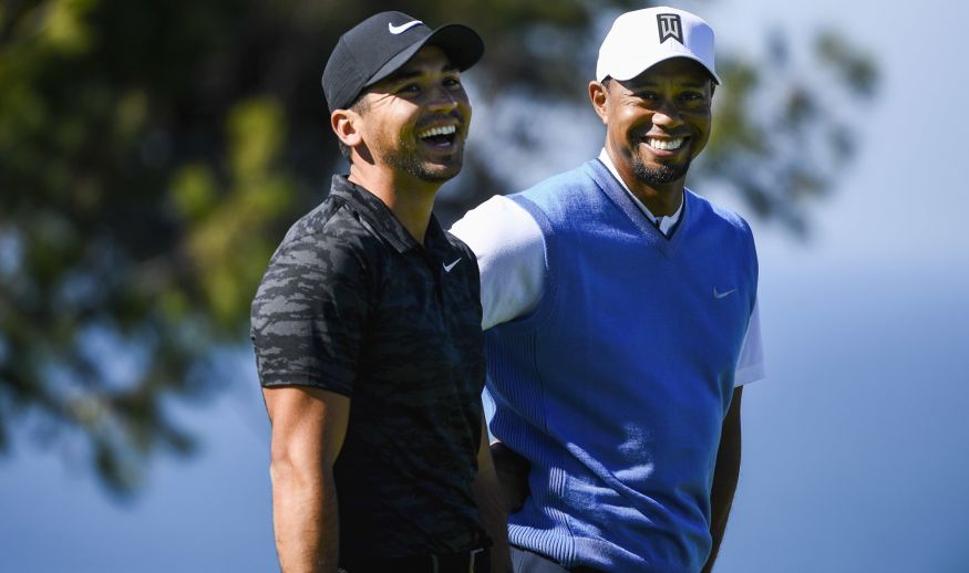 SAN DIEGO, CA - JANUARY 26:  Jason Day of Australia and Tiger Woods share a laugh on the fourth hole during the first round of the Farmers Insurance Open at Torrey Pines South on January 26, 2017 in San Diego, California.  (Photo by Donald Miralle/Getty Images)