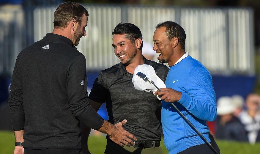 SAN DIEGO, CA - JANUARY 26:  (L-R) Dustin Johnson, Jason Day and Tiger Woods all celebrate their birdie putts on the 18th green on the south course during the first round of the Farmers Insurance Open at Torrey Pines Golf Course on January 26, 2017 in San Diego, California. (Photo by Stan Badz/PGA TOUR)