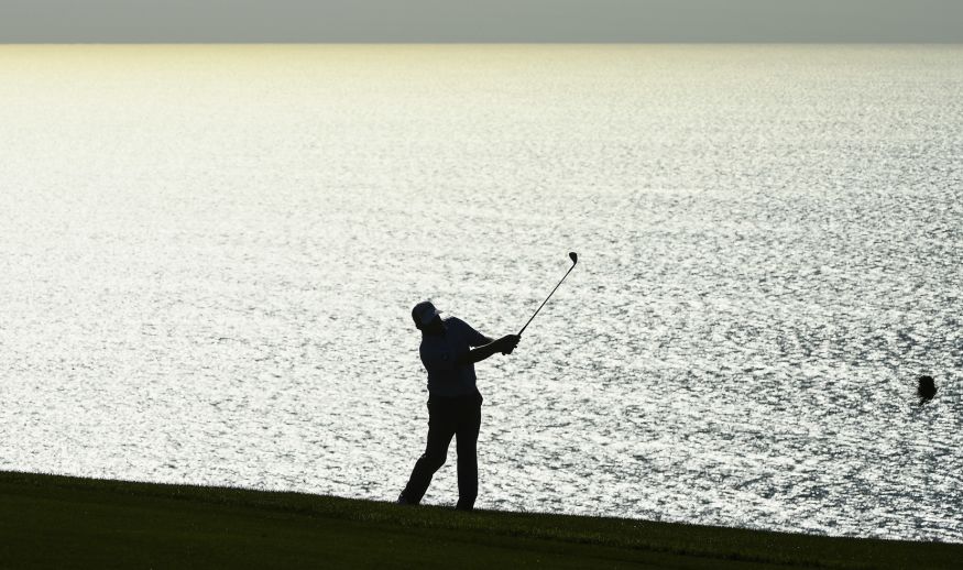 SAN DIEGO, CA - JANUARY 26:  A golfer plays his shot on the fourth hole during the first round of the Farmers Insurance Open at Torrey Pines South on January 26, 2017 in San Diego, California.  (Photo by Donald Miralle/Getty Images)