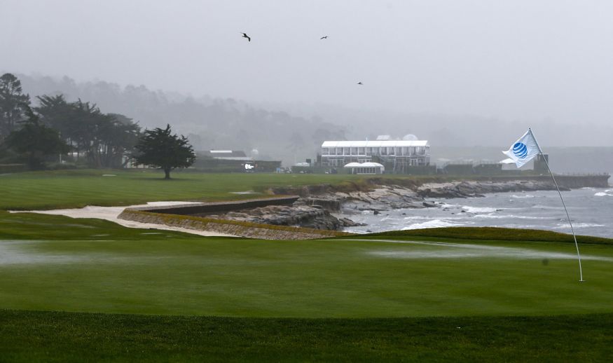 PEBBLE BEACH, CA - FEBRUARY 07:  Heavy rain and strong winds hammer the 18th hole allong the coast during a practie round for the AT&T Pebble Beach Pro-Am at Pebble Beach Golf Links on February 7, 2017 in Pebble Beach, California.  (Photo by Jonathan Ferrey/Getty Images)