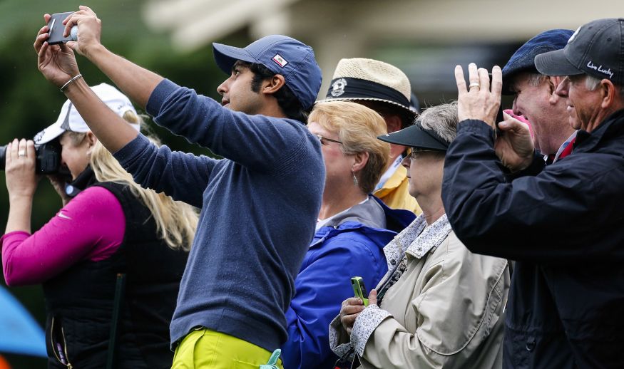 PEBBLE BEACH, CA - FEBRUARY 08:  Actor Kunal Nayyar takes a selfie with fans in the 3M Celebrity Challenge during a practice round for the AT&T Pebble Beach Pro-Am at Pebble Beach Golf Links on February 8, 2017 in Pebble Beach, California.  (Photo by Jonathan Ferrey/Getty Images)