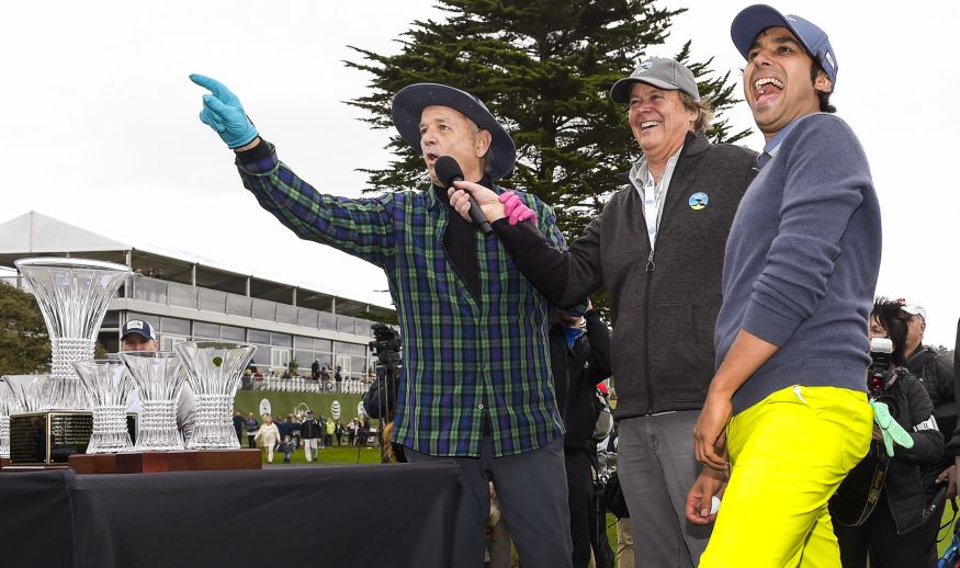 PEBBLE BEACH, CA - FEBRUARY 08: (L-R) Comedian Bill Murray and Big Bang actor Kunal Nayyar celebrate their win during the trophy ceremony at the 3M Celebrity Challenge at the AT&T Pebble Beach Pro-Am at Pebble Beach Golf Links, on February 8, 2017 in Pebble Beach, California. (Photo by Stan Badz/PGA TOUR)