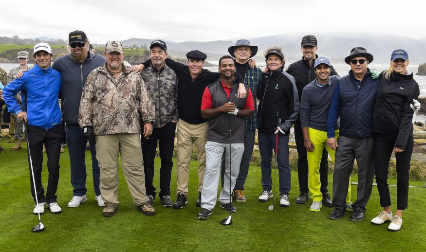 PEBBLE BEACH, CA - FEBRUARY 08: (L-R) Participating celebrities Kenny G, Toby Keith, Larry the Cable Guy, Huey Lewis, Clay Walker, Alfonso Ribeiro, Bill Murray, Gary Mule Deer, Josh Duhamel, Kunal Nayyar, Andy Garcia and Kelly Rohrbach pose for a group shot on the 18th hole during the 3M Celebrity Challenge for charities at the AT&T Pebble Beach Pro-Am at Pebble Beach Golf Links, on February 8, 2017 in Pebble Beach, California. (Photo by Stan Badz/PGA TOUR)