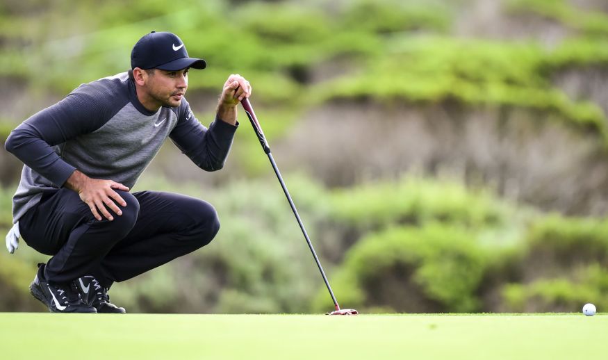PEBBLE BEACH, CA - FEBRUARY 09:  Jason Day of Australia lines up a putt on the 14th green during Round One of the AT&T Pebble Beach Pro-Am at Monterey Peninsula Country Club on February 9, 2017 in Pebble Beach, California.  (Photo by Harry How/Getty Images)