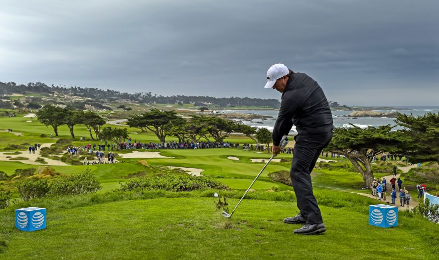 PEBBLE BEACH, CA - FEBRUARY 09: Phil Mickelson  plays a tee shot on the 11th hole during the first round of the AT&T Pebble Beach Pro-Am at Pebble Beach Golf Links, Spyglass Hill Golf Course, Monterey Peninsula Country Club (Shore Course) on February 9, 2017 in Pebble Beach, California. (Photo by Stan Badz/PGA TOUR)