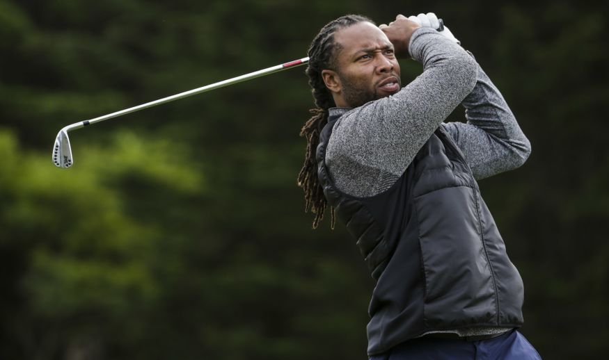 PEBBLE BEACH, CA - FEBRUARY 09:  Larry Fitzgerald hits his tee shot on the 5th hole during Round One of the AT&T Pebble Beach Pro-Am at Monterey Peninsula Country Club on February 9, 2017 in Pebble Beach, California.  (Photo by Jeff Gross/Getty Images)