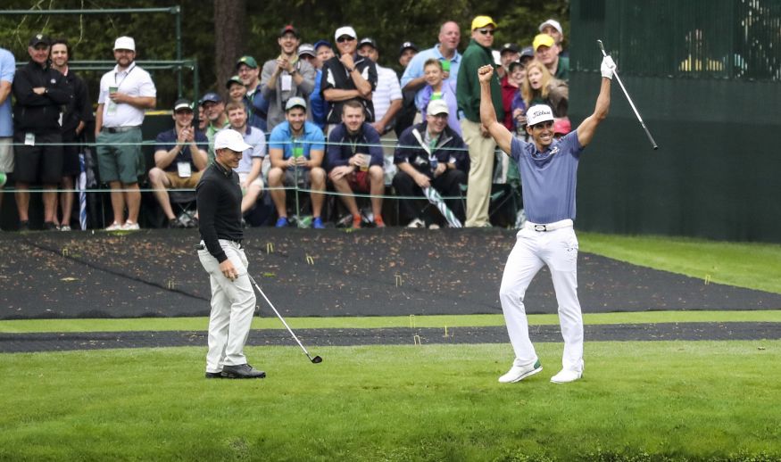 AUGUSTA, GA - APRIL 03:  Rafa Cabrera Bello of Spain celebrates skipping his ball across the pond on the 16th hole as Scott Gregory of England looks on during a practice round prior to the start of the 2017 Masters Tournament at Augusta National Golf Club on April 3, 2017 in Augusta, Georgia.  (Photo by Rob Carr/Getty Images)