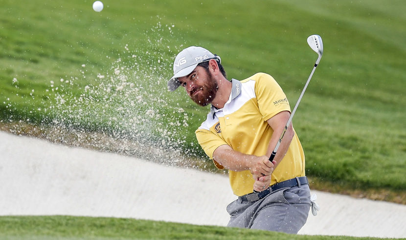 IRVING, TX - MAY 18:  Louis Oosthuizen of South Africa hits a shot out of the bunker on the 11th hole during Round One of the AT&T Byron Nelson at the TPC Four Seasons Resort Las Colinas on May 18, 2017 in Irving, Texas.  (Photo by Drew Hallowell/Getty Images)