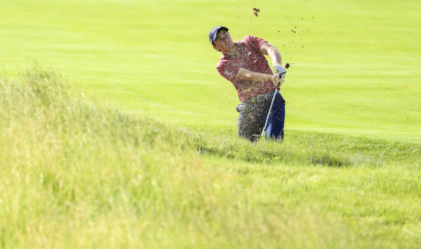 HARTFORD, WI - JUNE 15:  Paul Dunne of Ireland plays his shot from the bunker on the fourth hole during the first round of the 2017 U.S. Open at Erin Hills on June 15, 2017 in Hartford, Wisconsin.  (Photo by Andrew Redington/Getty Images)