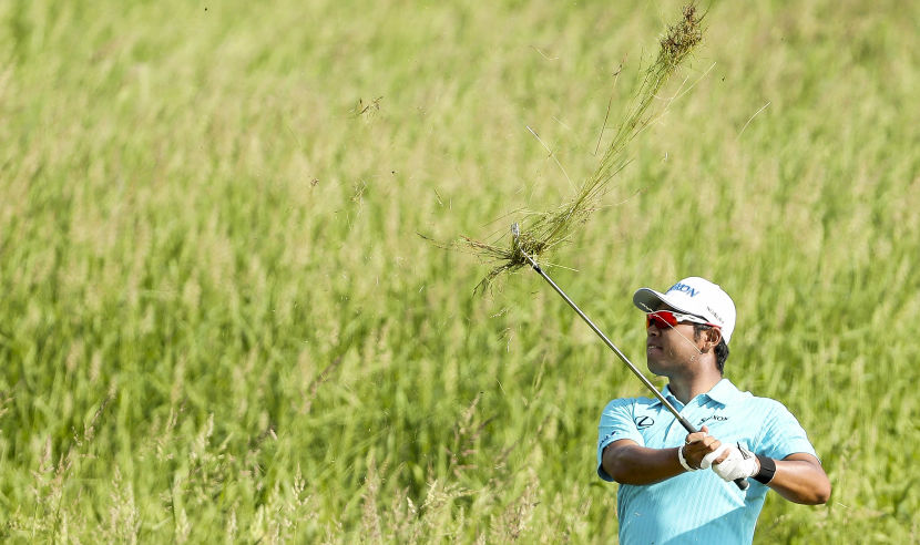 HARTFORD, WI - JUNE 15:  Hideki Matsuyama of Japan plays his second shot from deep rough on the par 5, 14th hole during the first round of the 117th US Open Championship at Erin Hills on June 15, 2017 in Hartford, Wisconsin.  (Photo by David Cannon/Getty Images)