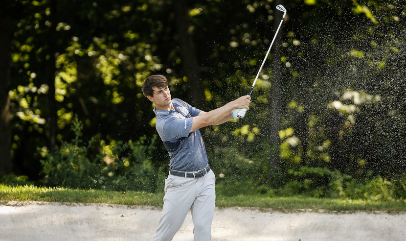 SILVIS, IL - JULY 13:  Ollie Schniederjans hits his second shot from a fairway bunker on the sixth hole during the first round of the John Deere Classic at TPC Deere Run on July 13, 2017 in Silvis, Illinois.  (Photo by Stacy Revere/Getty Images)