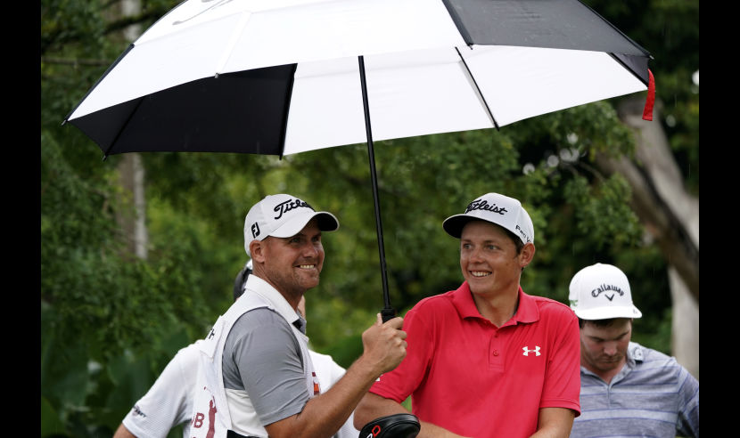 KUALA LUMPUR, MALAYSIA - OCTOBER 13:  Cameron Smith of Australia and his caddie have a light moment on the 5th hole during round two of the 2017 CIMB Classic at TPC Kuala Lumpur on October 13, 2017 in Kuala Lumpur, Malaysia.  (Photo by Stanley Chou/Getty Images)