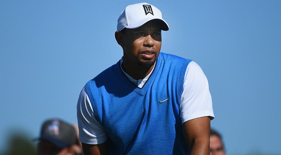 Tiger Woods opened with a 4-over 76 at the Farmers Insurance Open. (Donald Miralle/Getty Images)