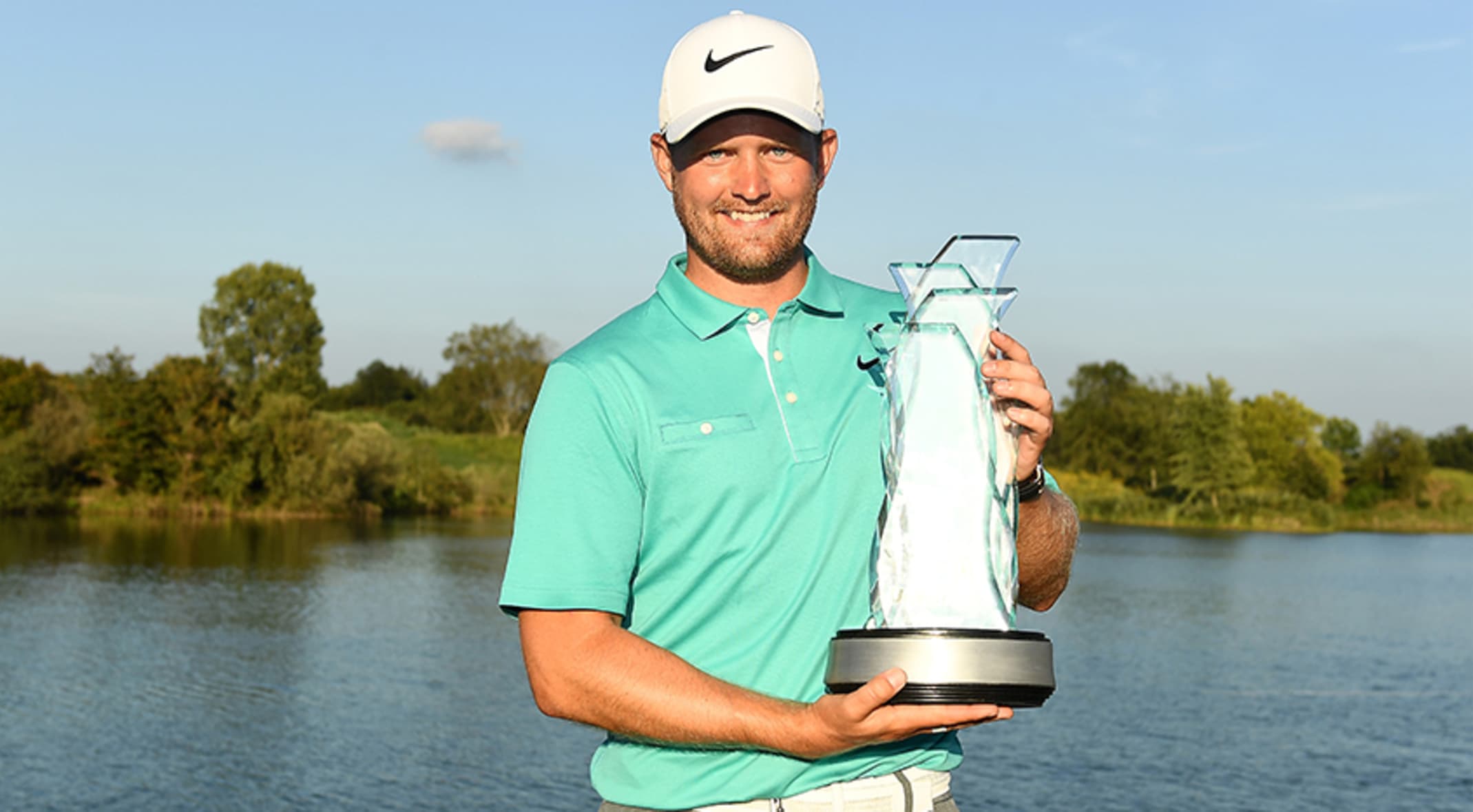 Tom Lewis with the Korn Ferry Tour Championship trophy