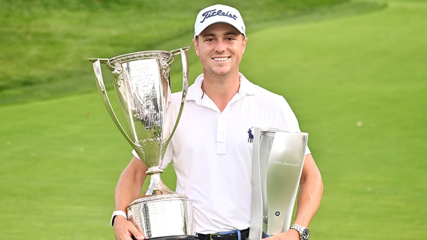 Justin Thomas with both BMW trophies