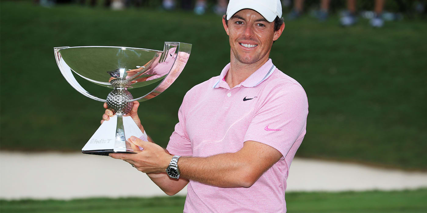 Rory McIlroy lifts the trophy