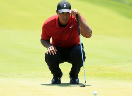 Tiger takes putting positives from Quicken Loans