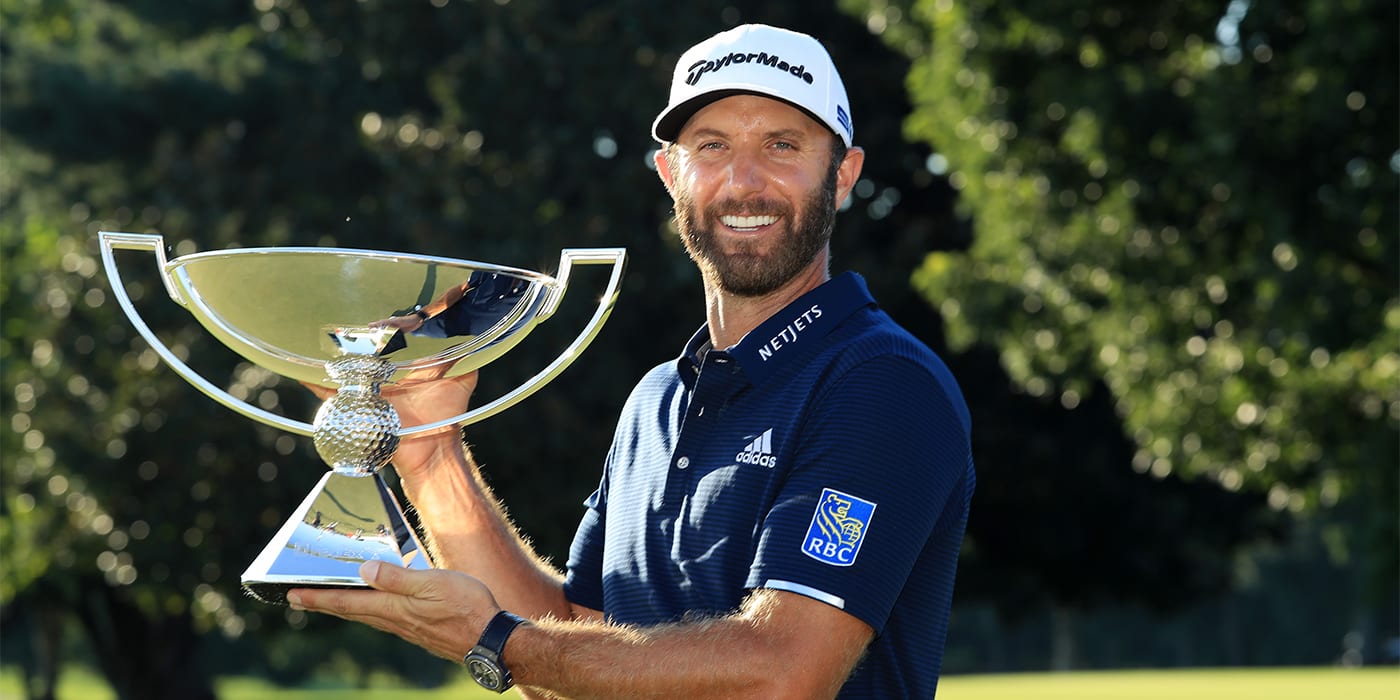 Dustin Johnson with the FedExCup trophy