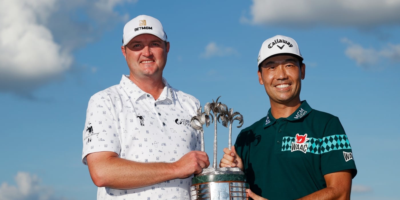 Jason Kokrak and Kevin Na with the QBE trophy