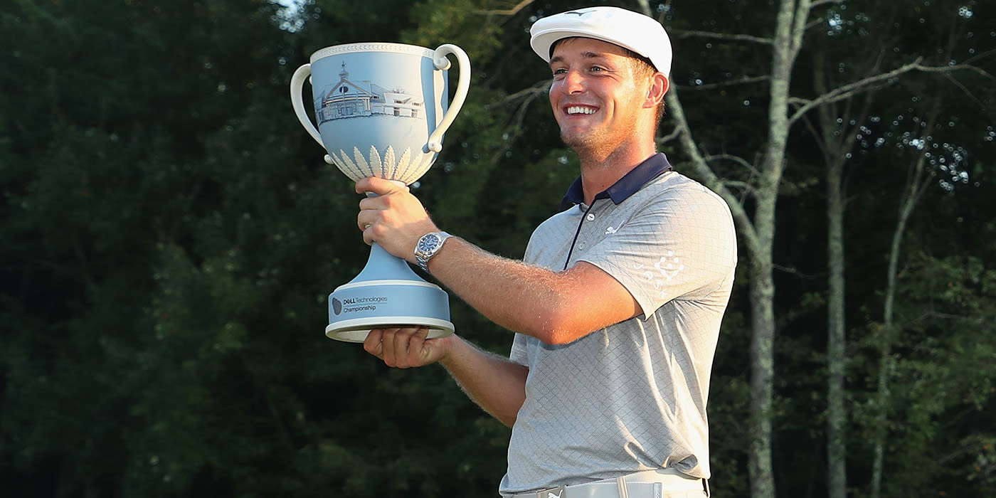 Bryson DeChambeau with Dell trophy
