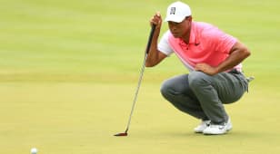 Tiger's new putter fails to heat up 