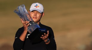 Kim closes strong to win The American Express