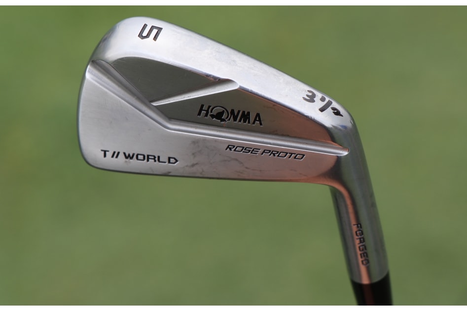 Justin Rose's Honma T//World Rose Proto MB long irons have a number written on their soles that display the amount of degrees his lie angles have been bent.