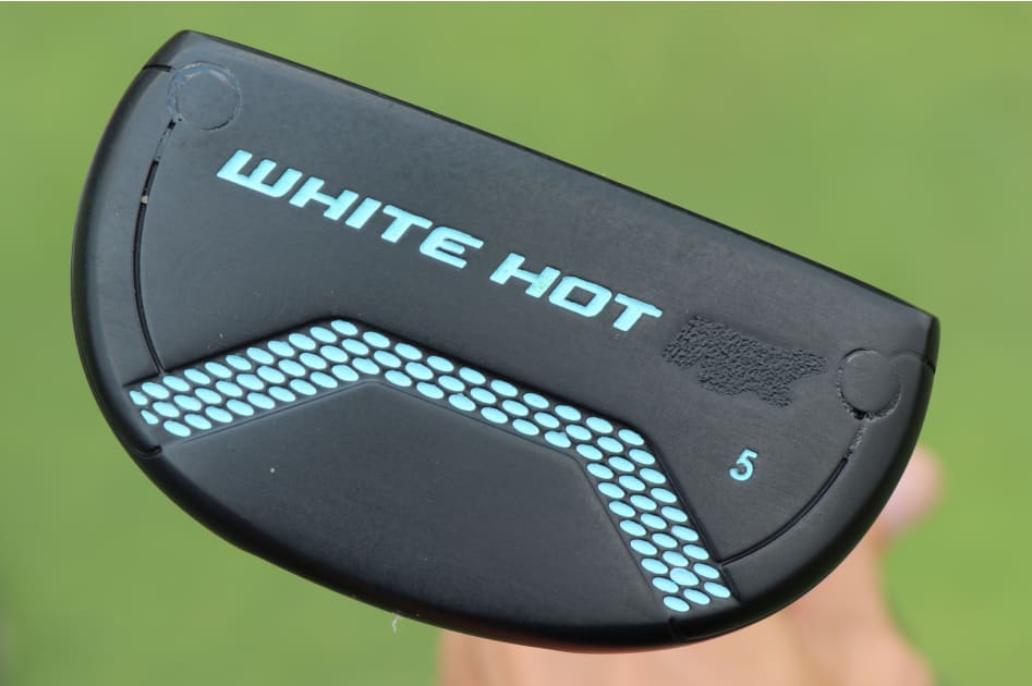 Abraham Ancer's custom Odyssey White Hot No. 5 putter, with a colorway to match his Porsche.